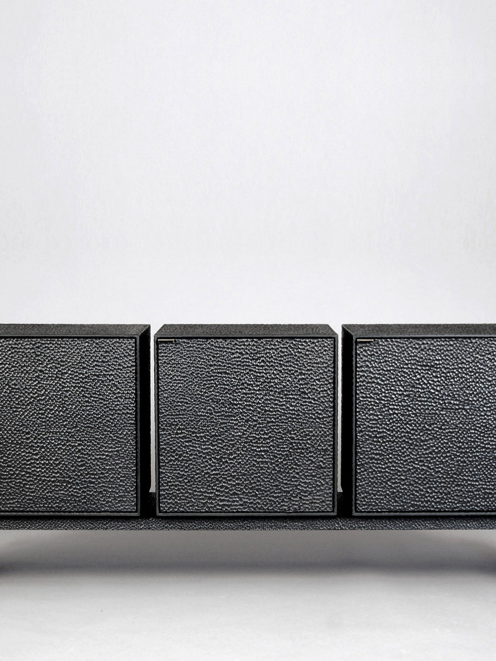 M3 Credenza in carved, blackened maple & brass by John Eric Byers for RUNE, New York.